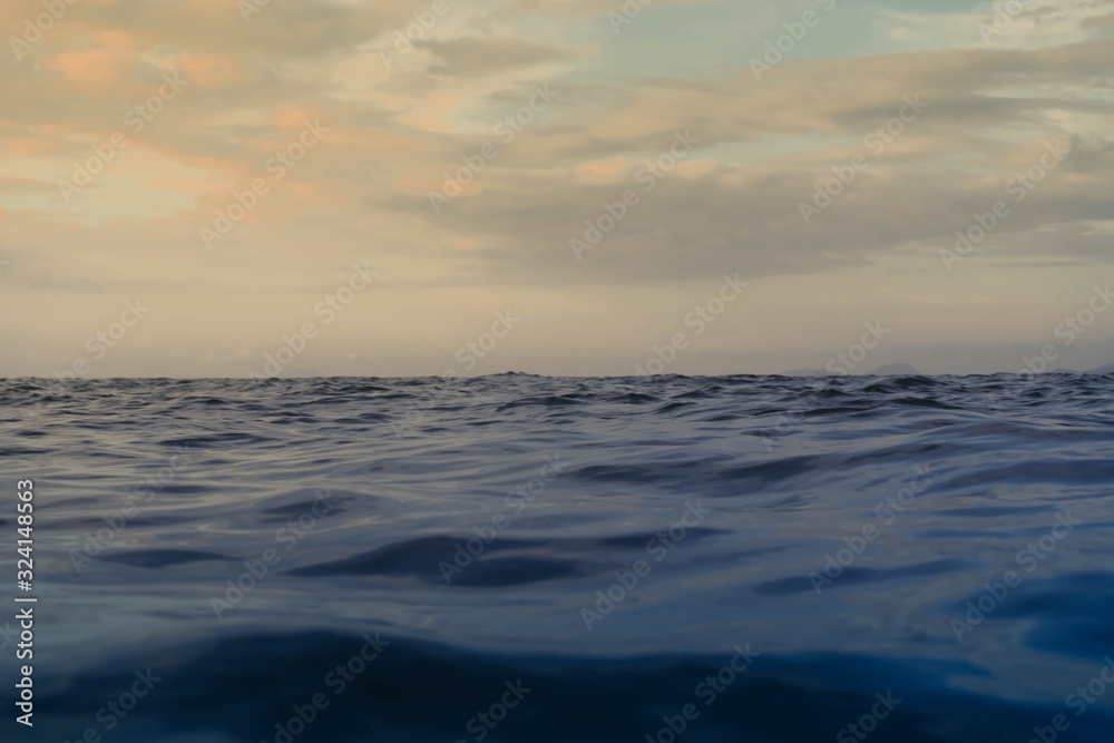 Sky and Sea wave low angle view in morning. Ocean water background. ocean wave close up view