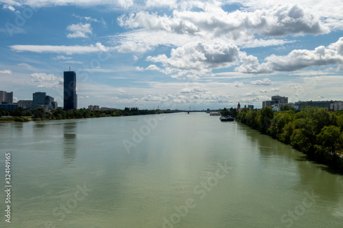 Beautiful view of Danube river from bridge in Vienna, Austria, summer day © Oana