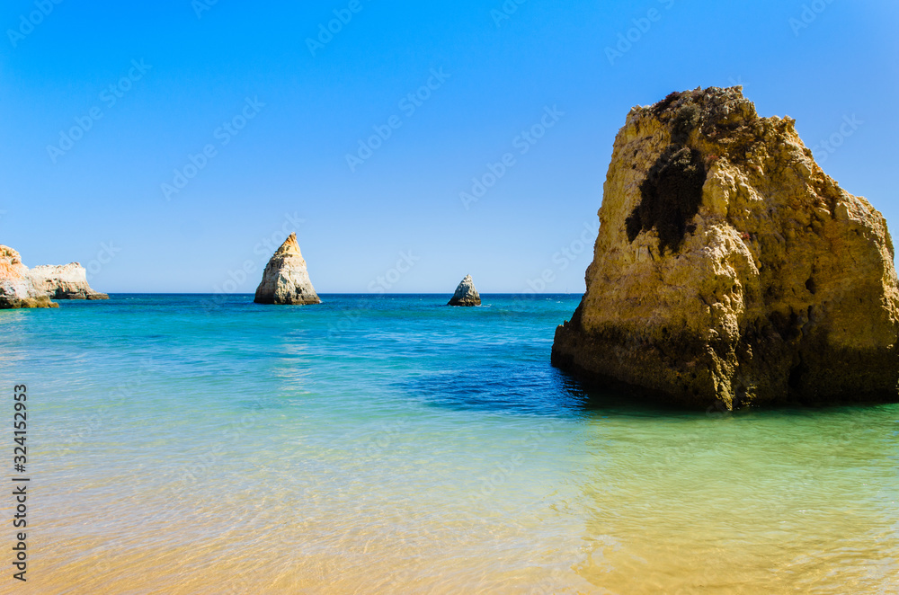 Fototapeta premium The three brothers beach in Alvor, Algarve region, Portugal