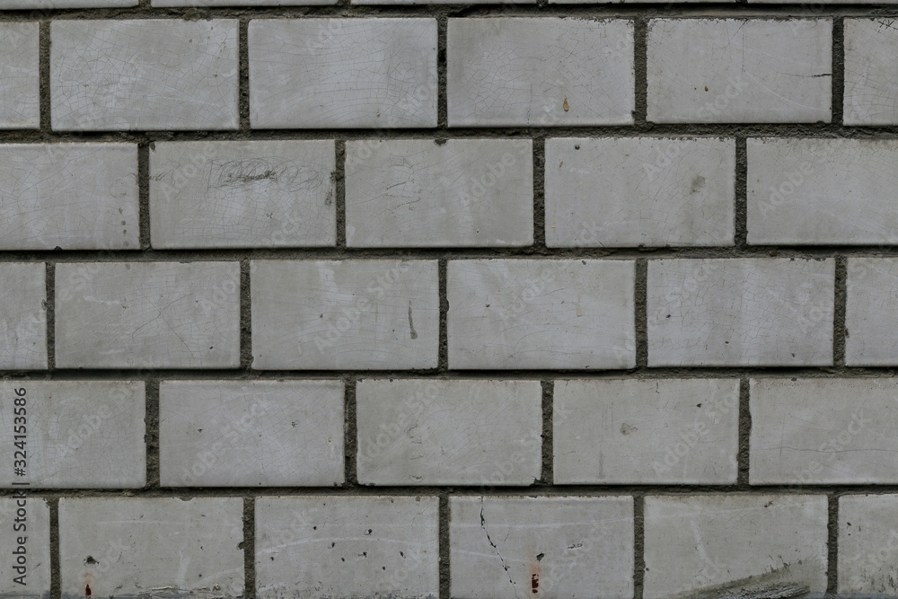 Obraz premium old rough gray brick wall