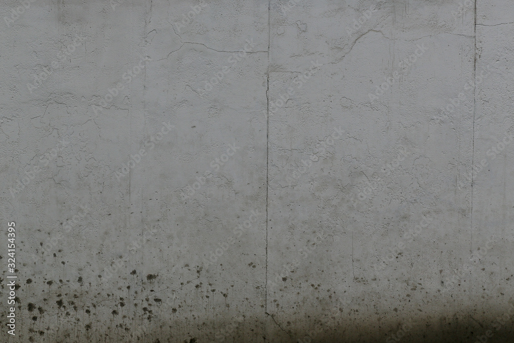 gray rough concrete wall surface texture with dirt marks