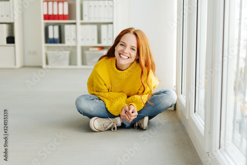 Young woman with a happy beaming smile