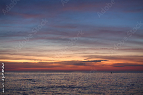 Sea pink sunset. Beautiful color clouds. © anya babii