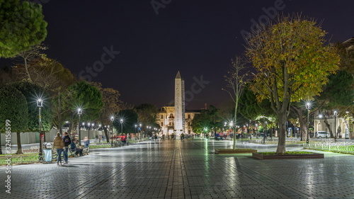 Obelisk of Theodosius with hieroglyphs in Sultanahmet Square night timelapse hyperlapse, Istanbul, Turkey photo