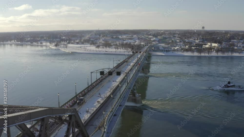 The Peace Bridge in Buffalo, New York. This is one clip of many in this series - each of which shows a different angle of the bridge and slightly different contents (city / cars) in the frame. The Peace Bridge in Buffalo, New York. This is one clip of many in this series - each of which shows a different angle of the bridge and slightly different contents (city / cars) in the frame.