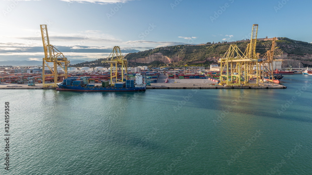 Aerial view of the sea cargo port and container terminal of Barcelona timelapse, Barcelona, Catalonia, Spain.