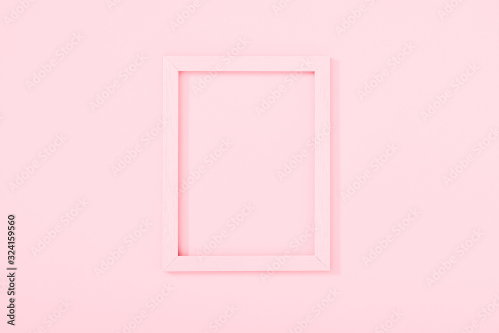 Empty pink photo frame on pastel pink background. Flat lay, top view, copy space Empty pink photo frame on pastel pink background. Flat lay, top view, copy space