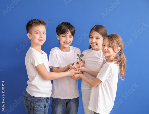 Little children with plant ...