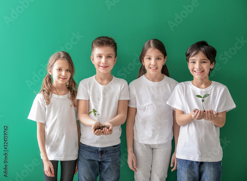 Little children with plants...