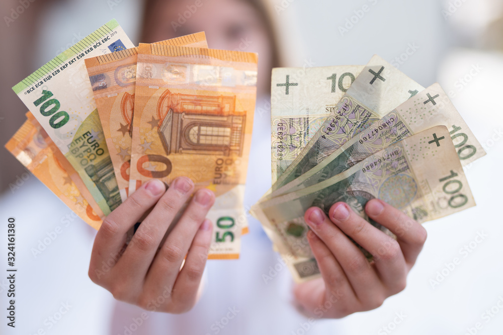 mix of zloty polish currency cash bank notes exchange rates against euro money mix of zloty polish currency cash bank notes exchange rates against euro money