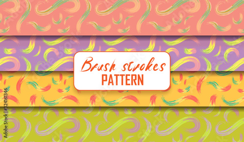 Seamless patterns of four artistic brush strokes textures in soft pink, violet, yellow, and green
