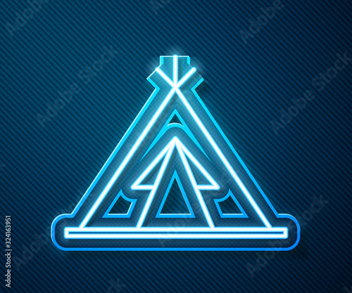 Glowing neon line Traditional indian teepee or wigwam icon isolated on blue background. Indian tent. Vector Illustration