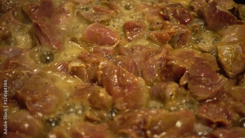 Preparation of beef in cast iron pan. Preparation of beef in cast iron pan.