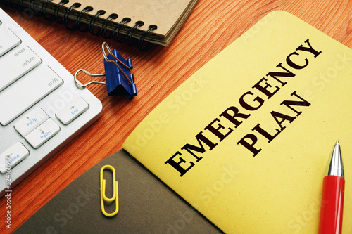 Emergency plan or Disaster Preparedness on the desk. photo