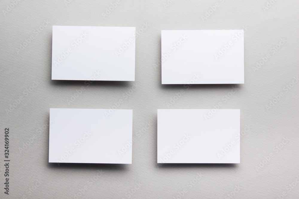 Business card blank on wooden background. Corporate Stationery, Branding Mock-up. Creative designer desk. Flat lay. Copy space for text Business card blank on wooden background. Corporate Stationery, Branding Mock-up. Creative designer desk. Flat lay. Copy space for text