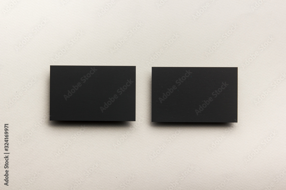 Business card blank on wooden background. Corporate Stationery, Branding Mock-up. Creative designer desk. Flat lay. Copy space for text Business card blank on wooden background. Corporate Stationery, Branding Mock-up. Creative designer desk. Flat lay. Copy space for text