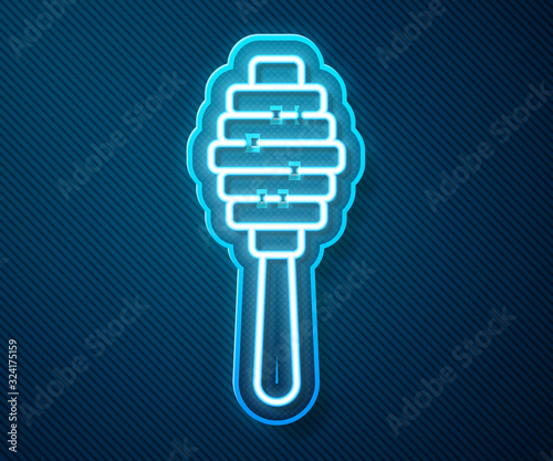 Glowing neon line Honey dipper stick icon isolated on blue background. Honey ladle. Vector Illustration