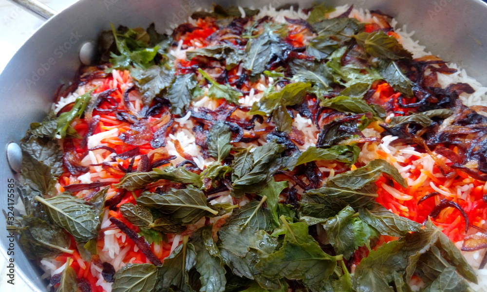 Hyderabad Chicken Spicy fried rice is ready to serve and decorations by ...