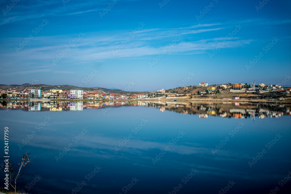 panorama of the city reflected at the lake