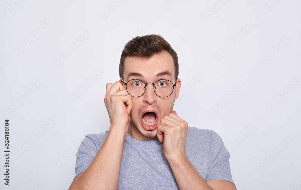 A surprised man with glasses opened his mouth.