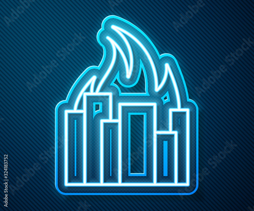 Glowing neon line Fire in burning buildings on city street icon isolated on blue background. Destroyed city on fire. Vector Illustration