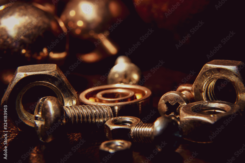 bolts and nuts and other items on the table bolts and nuts and other items on the table