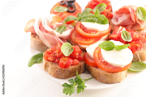 assorted of bruschetta- bread with tomato, cheese and basil