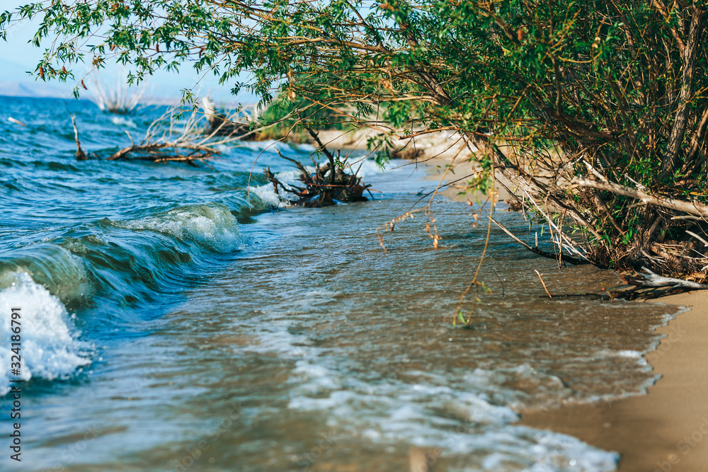 Summer sea and beautiful beach of Kazakhstan. Blue waves, Sunset, storm, hello summer. Summer sea and beautiful beach of Kazakhstan. Blue waves, Sunset, storm, hello summer.