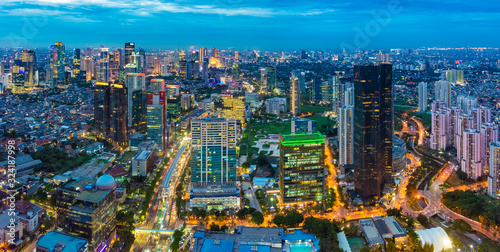 Aerial view of Jakarta Central Business District (Sudirman and Kuningan) at sunset/dusk.