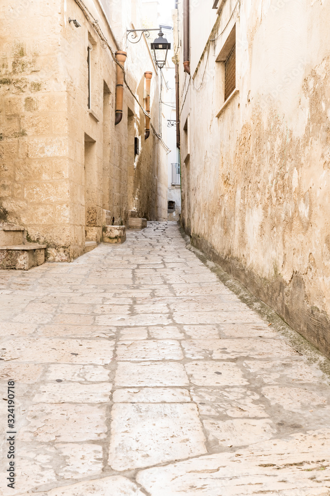 narrow street in historical town Altamura, Italy