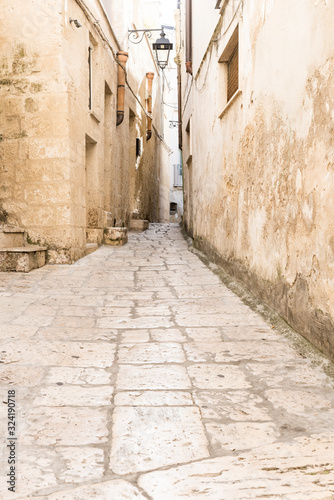 narrow street in historical town Altamura, Italy