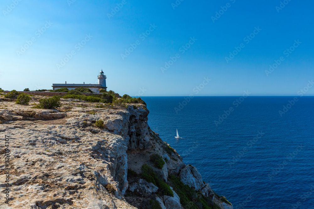 Travels-The Cap Blanc Lighthouse is located on the Cape of the same name at the eastern end of the Bay of Palma. Balearic Islands, Mallorca, Spain,
