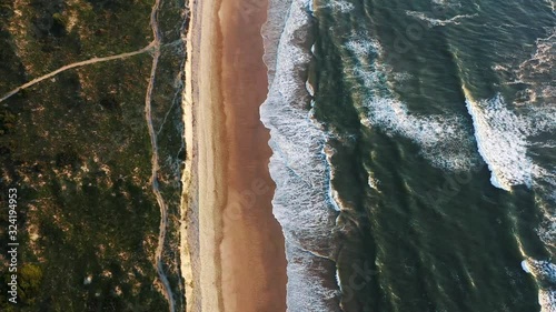 Wallpaper Mural Beach on aerial drone top view with ocean waves reaching shore, top view aerial photo from flying drone of an amazingly beautiful sea landscape. Torontodigital.ca