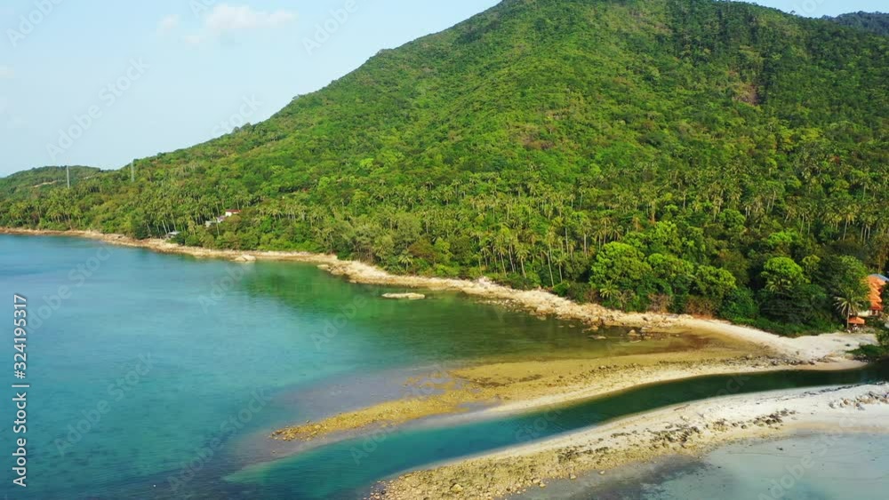 Thailand coast with hils and palm forest, small channel and emerald sea water Thailand coast with hils and palm forest, small channel and emerald sea water