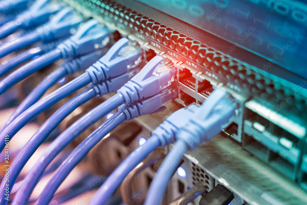 network cable connecting on network core switch close up Stock Photo ...