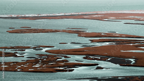 Amazing turquoise water pattern in Western Iceland photo