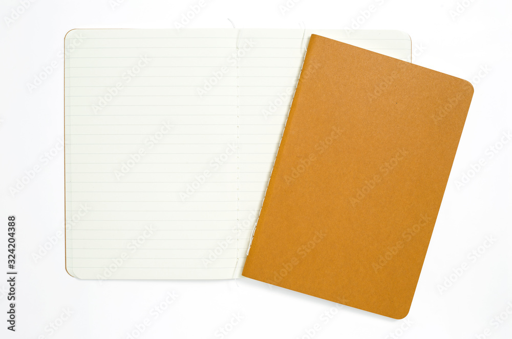 Top view of open stitch blank recycled paper cover notebook on white background.