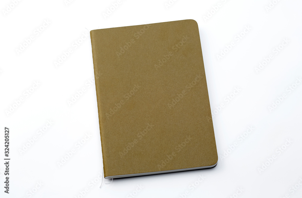 Top view of closed stitch blank recycled paper cover notebook on white background.