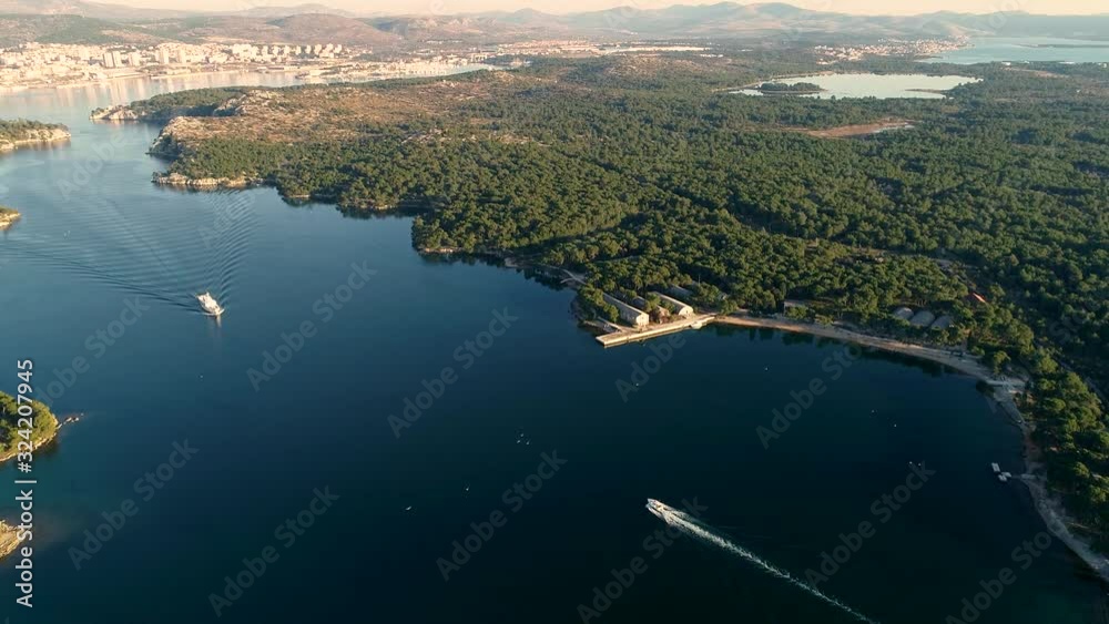 Aerial view of a boat navigating at Sveti ante canal, Šibenik, Croatia