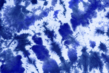 tie dye pattern hand dyed on cotton fabric abstract texture background.