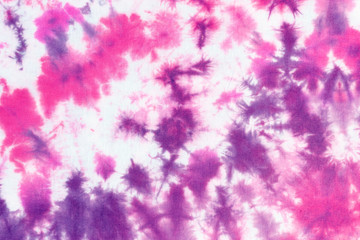 tie dye pattern hand dyed on cotton fabric abstract texture background.