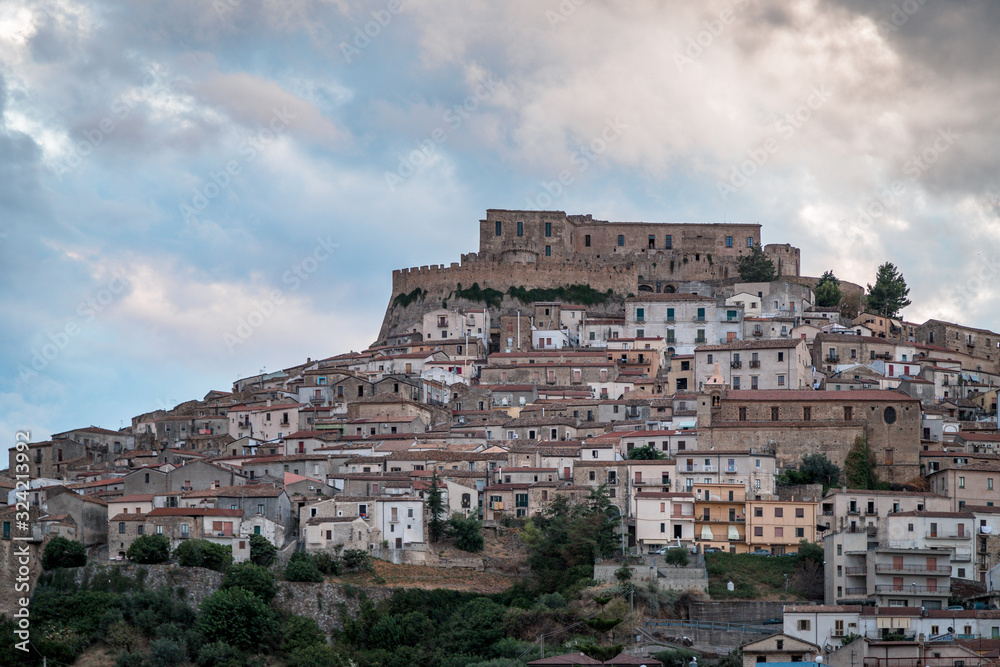 View of ancient village of Rocca Imperiale, in Calabria, during a sunset of August