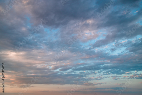 Sunset sky with colored clouds