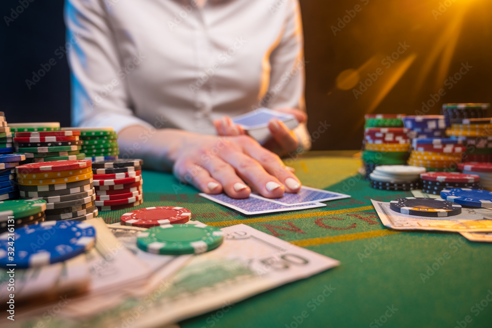 Playing poker or blackjack. Casino, playing in a night club. Playing poker or blackjack. Casino, playing in a night club.