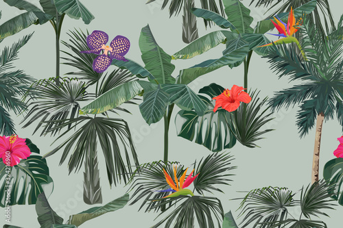 Tropical seamless pattern with palm trees, strelitzia, orchid and hibiscus. S...