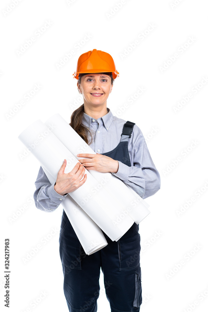 Woman builder with engineering drawings in her hands smiling. Isolated Woman builder with engineering drawings in her hands smiling. Isolated