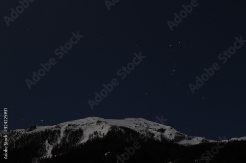 beautiful night sky with amazing stars in the northern alps