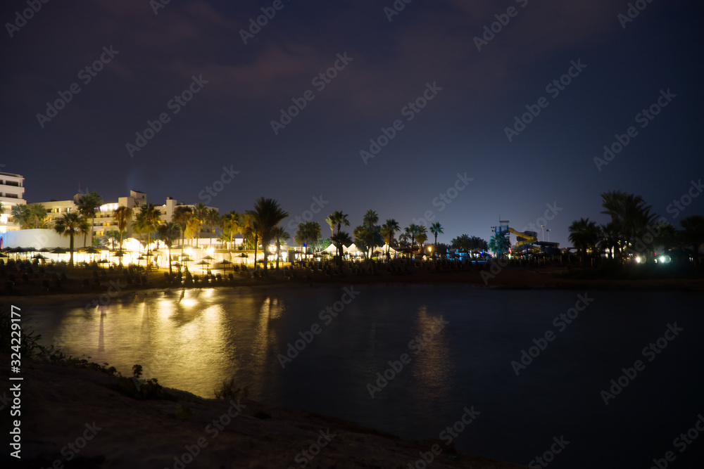 Night view of Latchi Adams Beach in Ayia Napa, Cyprus.