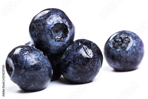 a handful of blueberries close-up isolated on white background