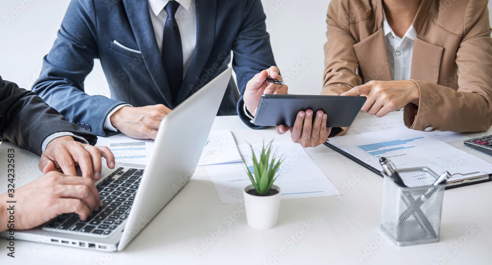 Group of Business partner professional team working together meeting are discussing and analyzing with new strategy marketing project investment to growth up profit into company Group of Business partner professional team working together meeting are discussing and analyzing with new strategy marketing project investment to growth up profit into company
